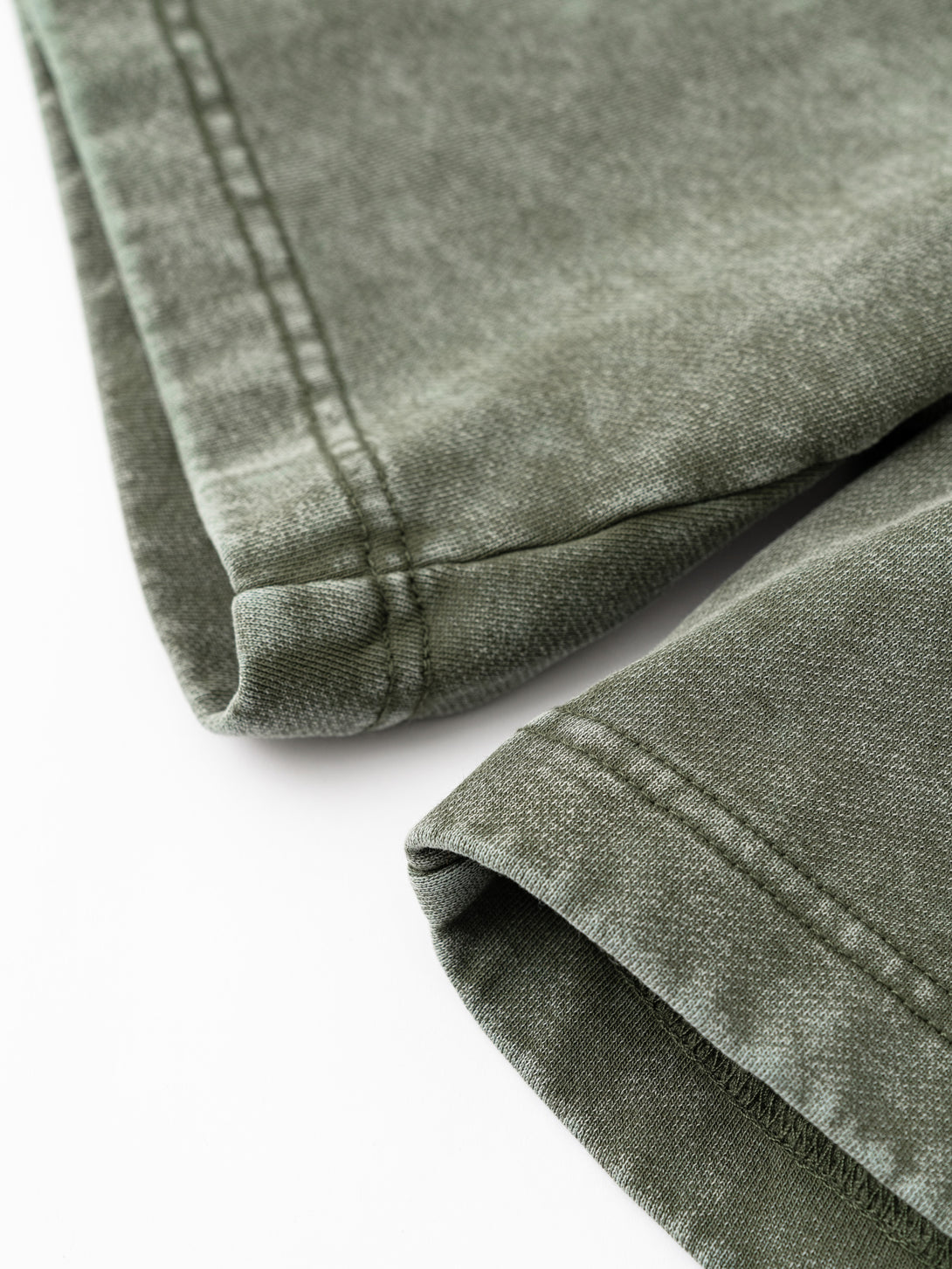 Hem finish of relaxed-fit heavy cotton shorts