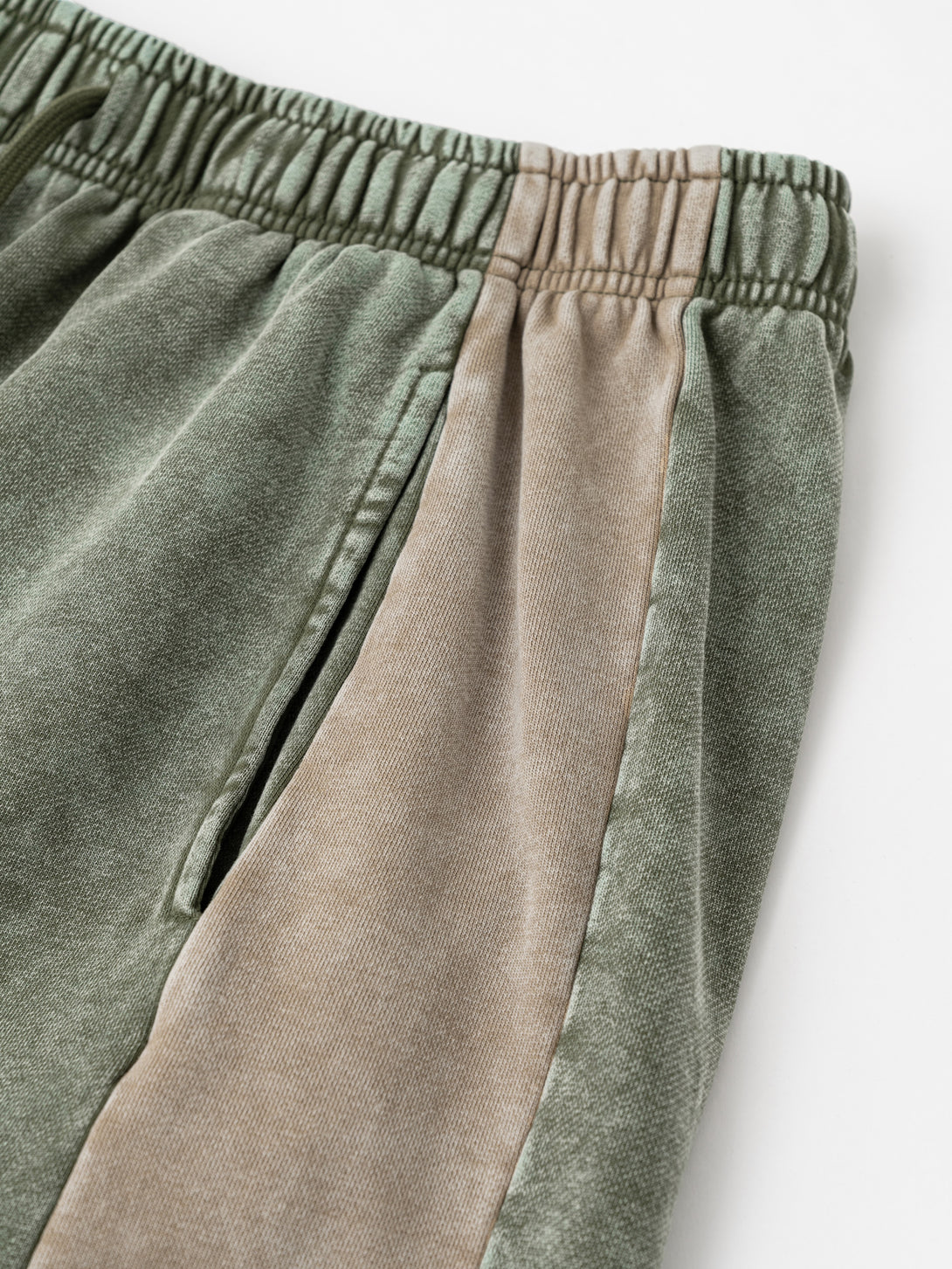 Top section of colorblock side panel with contrast stitching