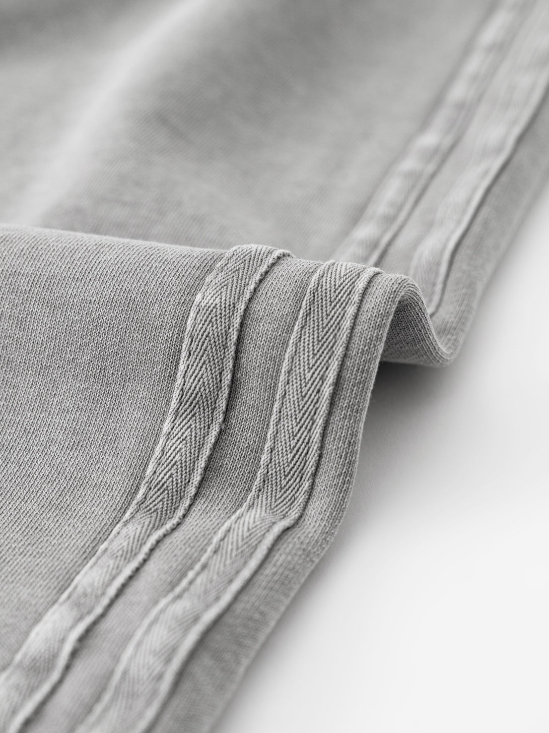 Contrast woven tape on side seam of heavy wash skirt