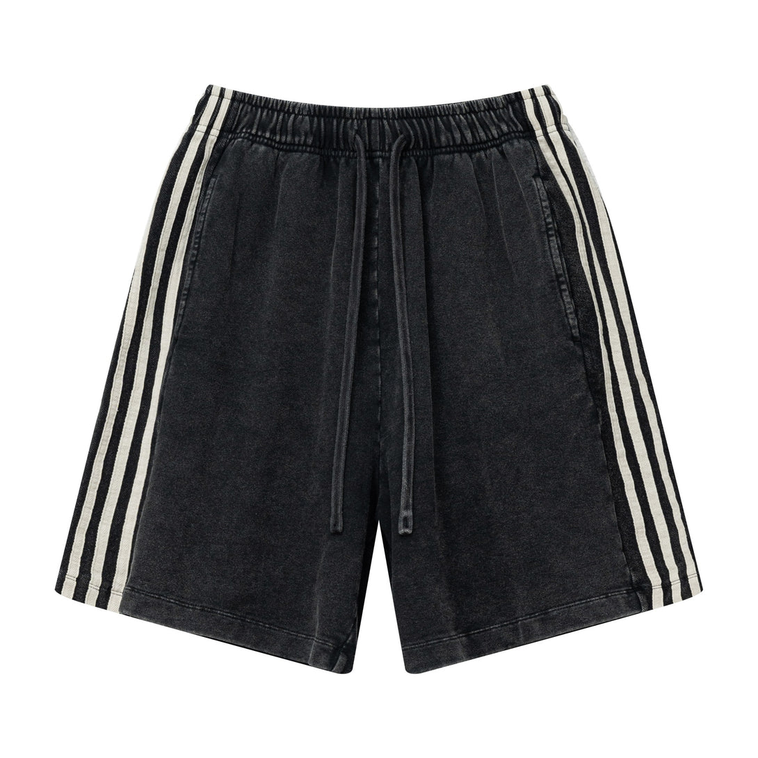 Front view of men's heavy wash snow shorts in Vintage Black with side stripes
