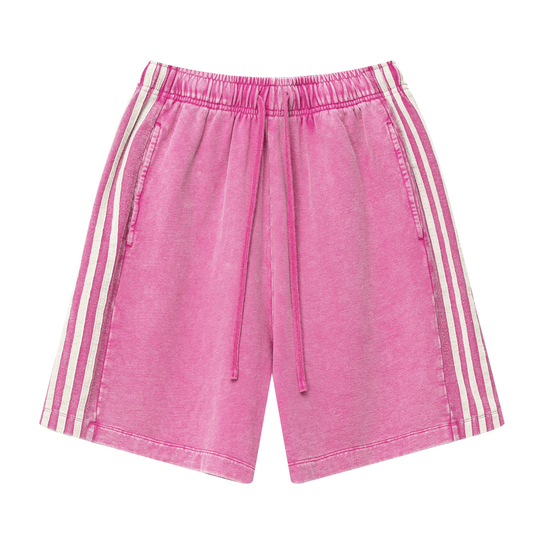 Front view of men's heavy wash snow shorts in Vintage Pink with white side stripes