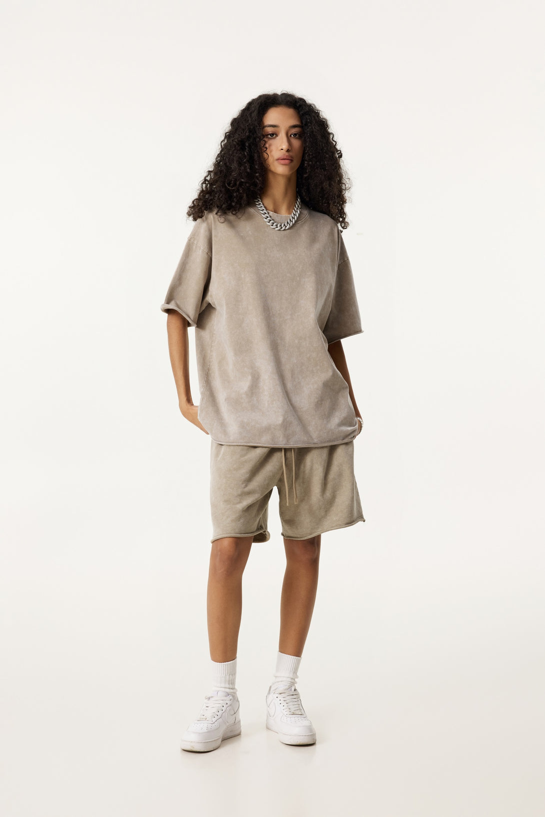 Model wearing front view of vintage streetwear shorts