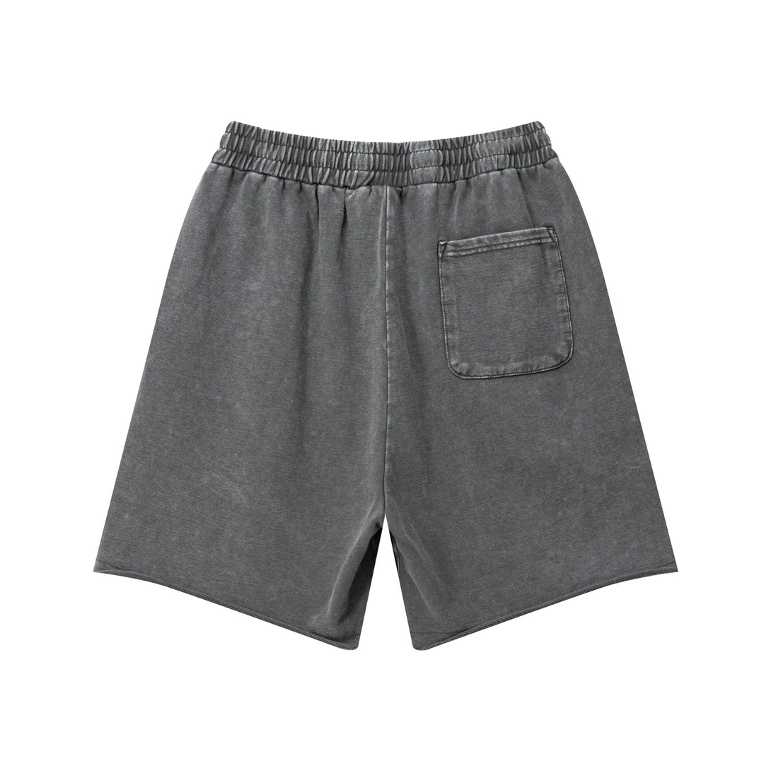 Back view of heavy wash streetwear shorts in dark gray