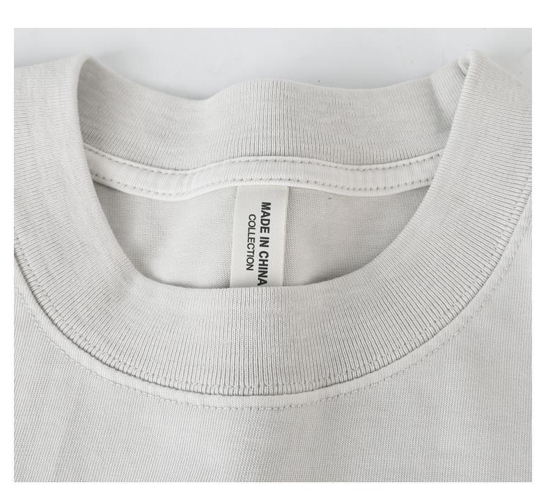 close-up detail of 1x1 ribbed collar on heavyweight vintage wash t-shirt