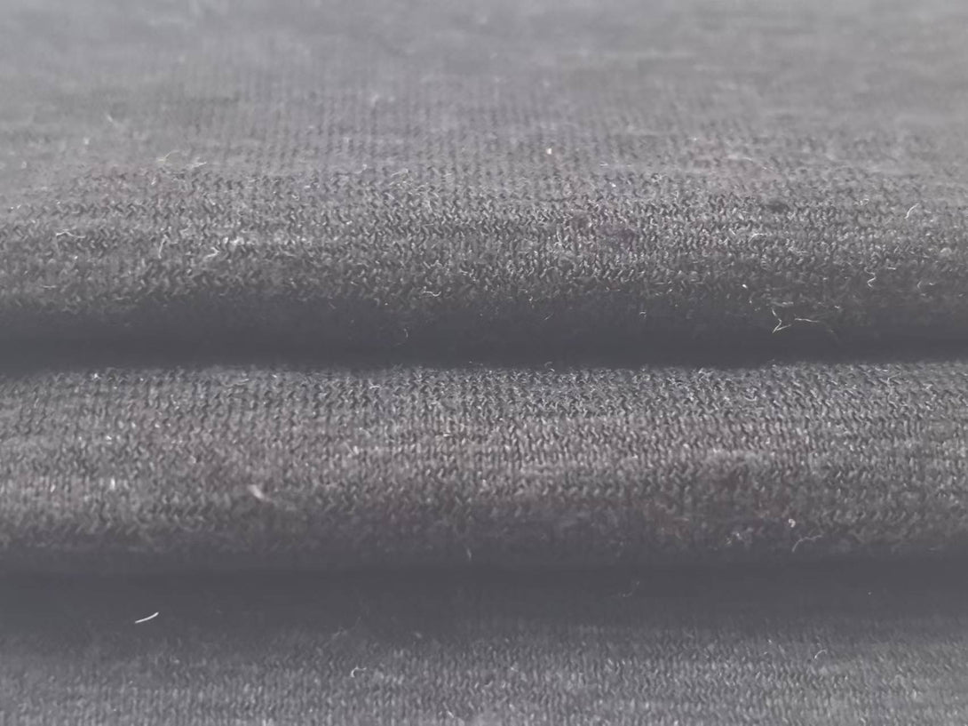 Close-Up: 55% Hemp 45% Organic Cotton Jersey Fabric Swatch (Navy Blue) - Durable Eco-Blend Textile for Wholesale Clothing