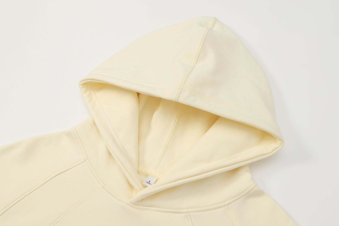 Reinforced hood drawstring channel