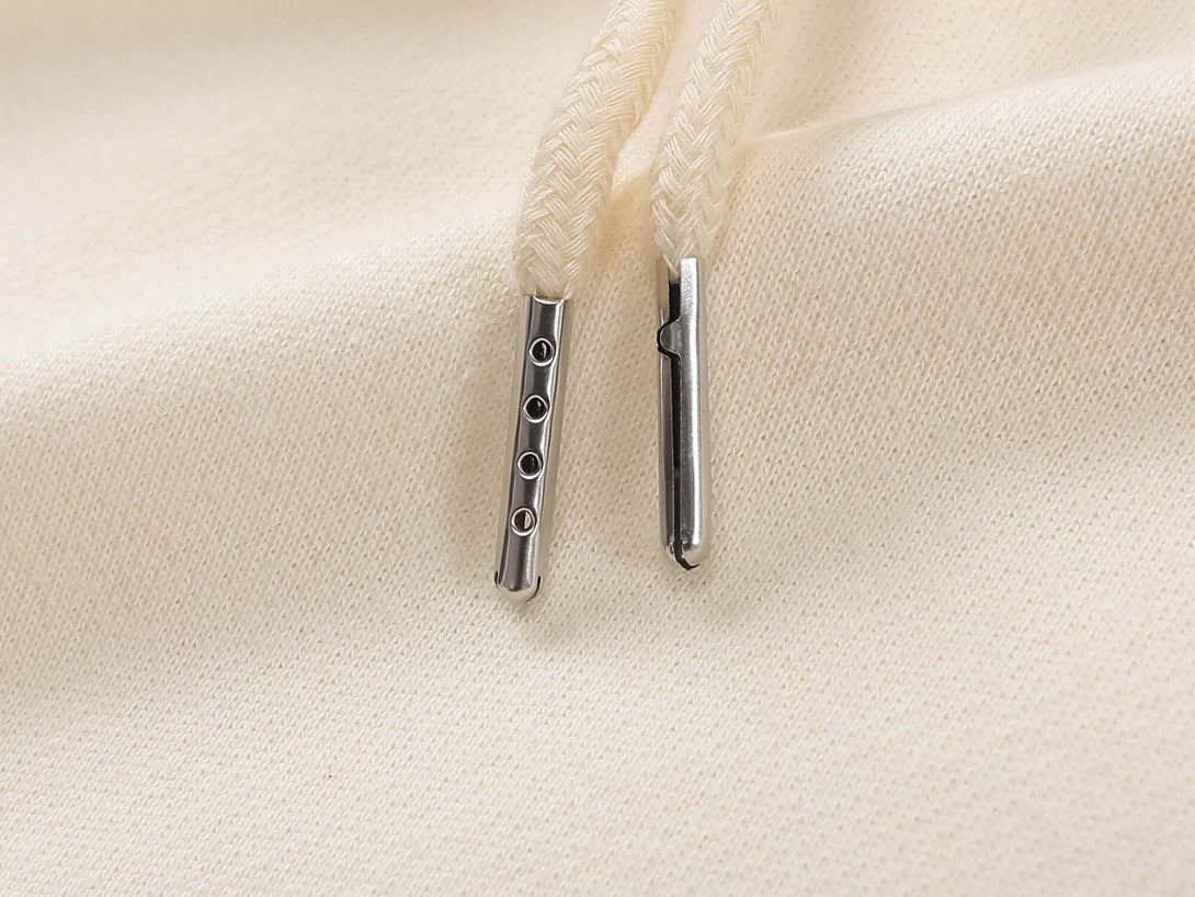 Reinforced drawstring ends for durability