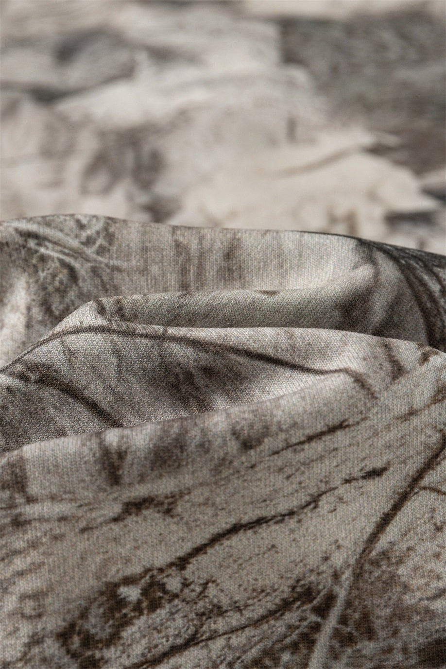 Close-up view of Men's 240g Camouflage All Over Print T-Shirt fabric texture in gray tones.