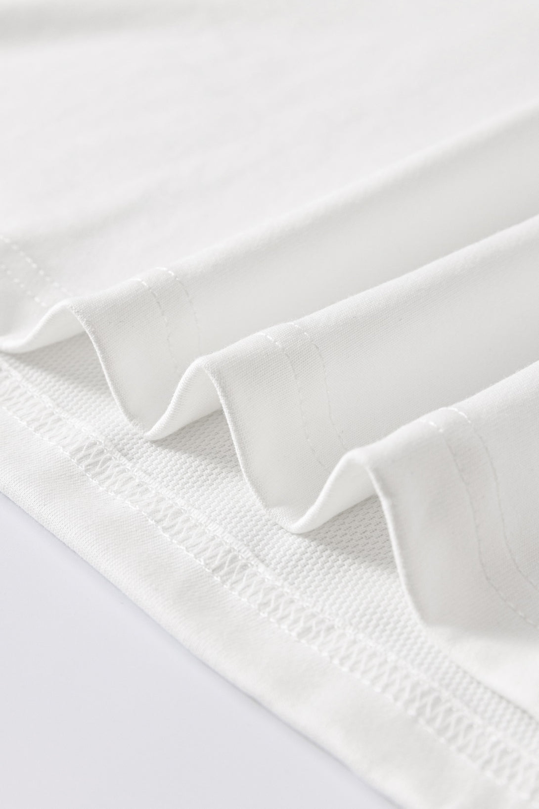 Close-up of the fabric detail of a Men's 240g Camo Panel Quick-Dry T-Shirt with sublimation printing technology.