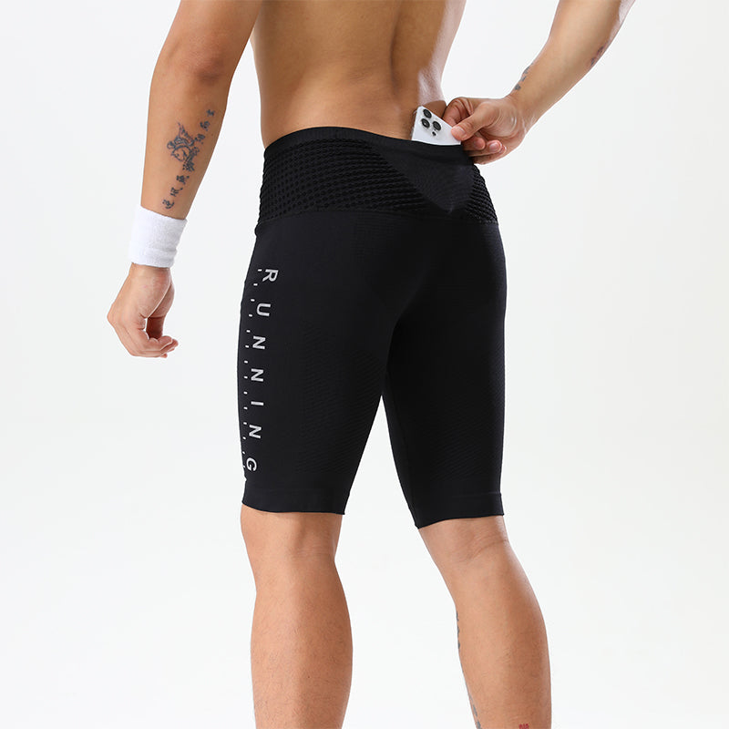 Model demonstrating back fit in dual-color compression shorts