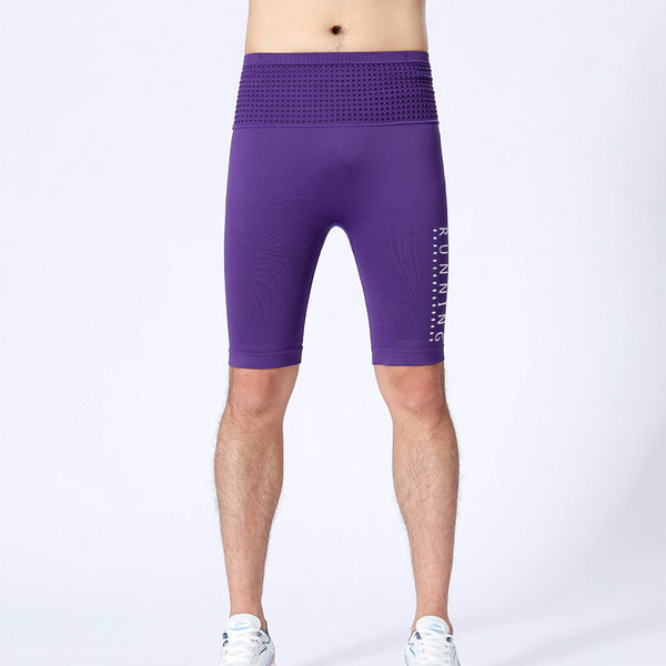 Jumping motion in purple men's compression sportswear