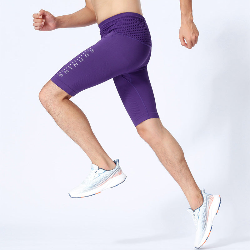 Jumping motion in purple men's compression sportswear