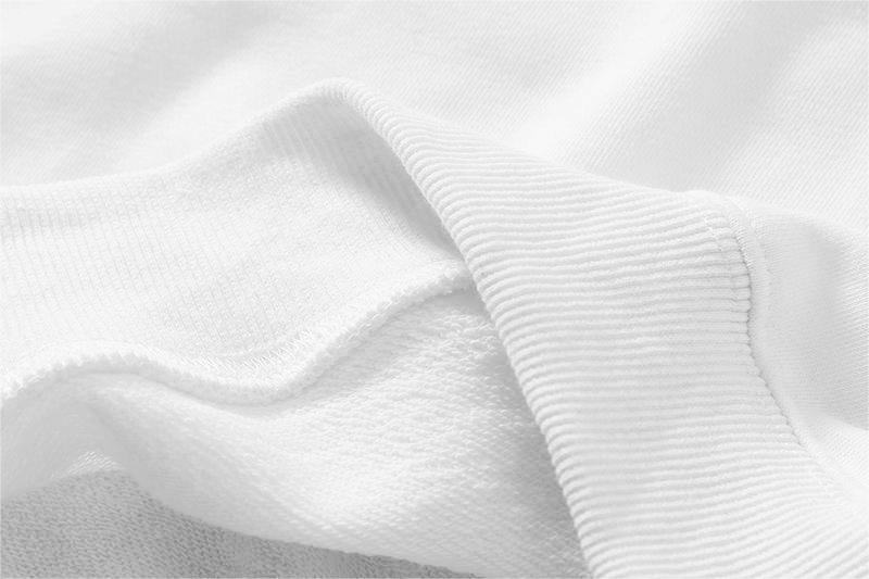 Close-up showing the precise hem stitching on the Organic Cotton Recycled Polyester Sweatshirt.
