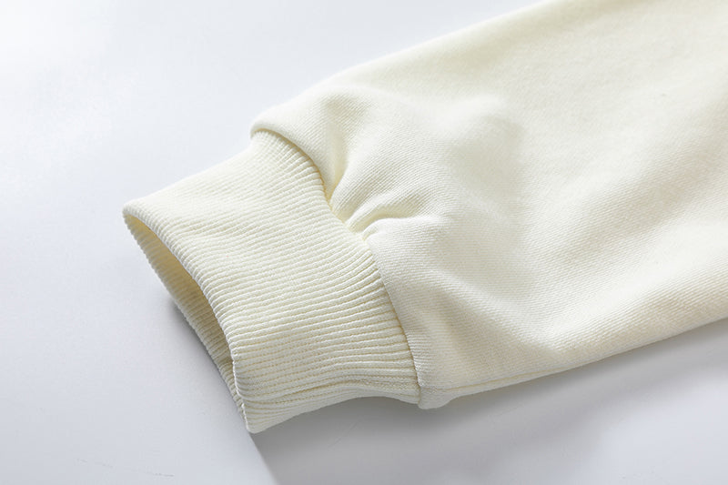 Close-up detail of the reinforced ribbed cuff on the Organic Cotton Sweatshirt.