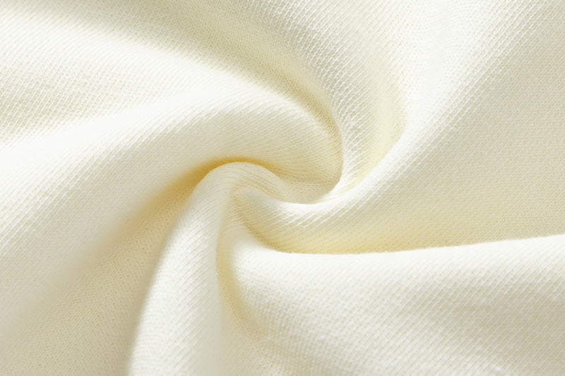 Texture and weave detail of the face of the heavyweight organic cotton fabric.