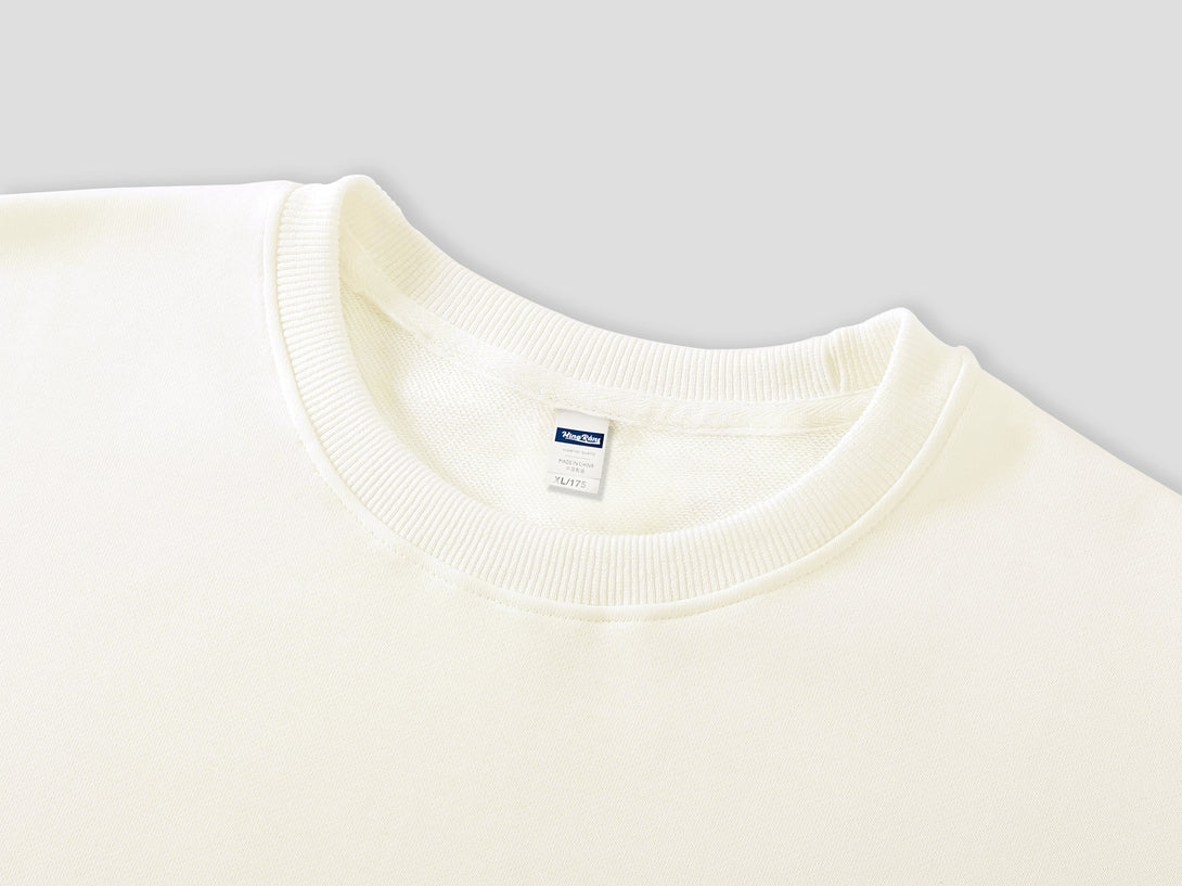 Close-up detail of the 1x1 ribbed collar on the Organic Cotton Sweatshirt.