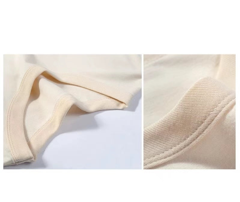 Close-up detail of collar stitching on organic cotton t-shirt