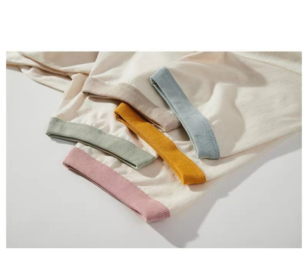 Close-up detail of short cuff on organic cotton T-shirt