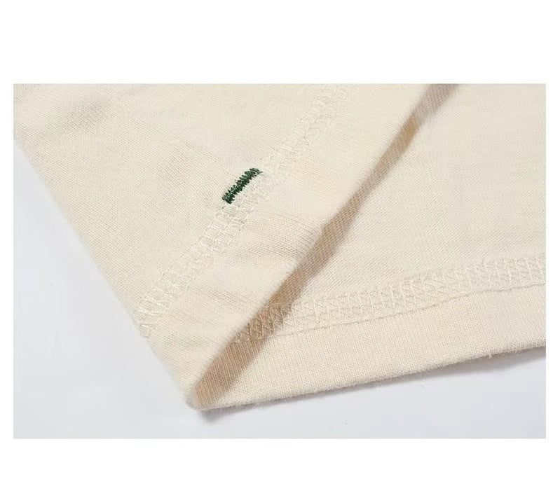 High-quality hem finish on 180g organic cotton unisex crew-neck tee