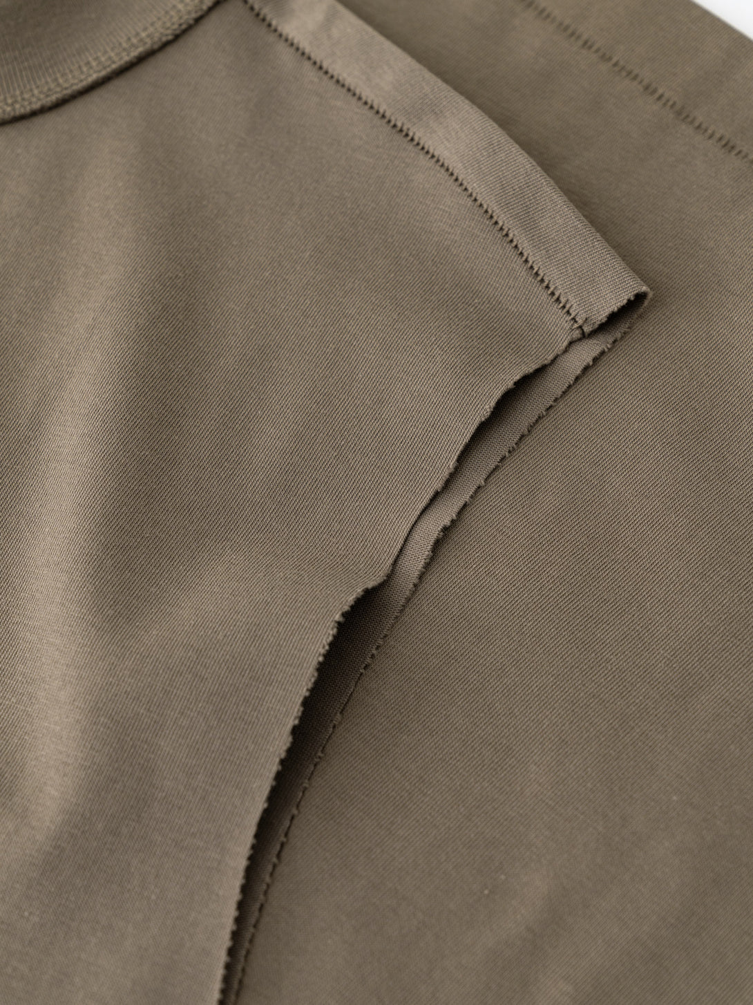 Armhole detail of Gray Camel oversized tank - durable construction for wholesale
