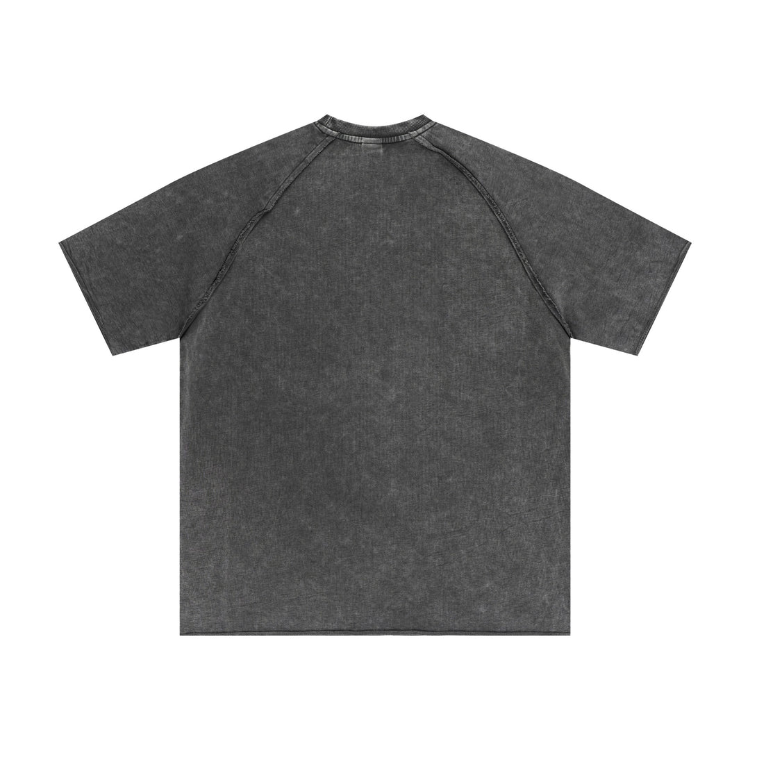 Medium gray snow-wash t-shirt back view featuring raw-edge trim. Vintage wholesale apparel essential.