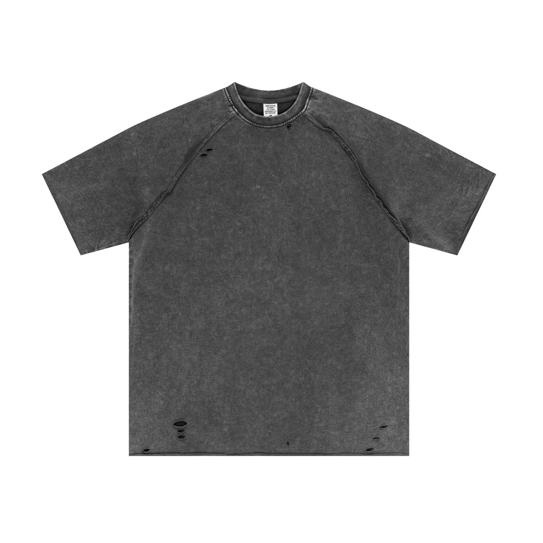 Medium gray oversized cotton t-shirt with snow-wash finish and raw-edge trim, front view. Bulk vintage apparel for clothing businesses.