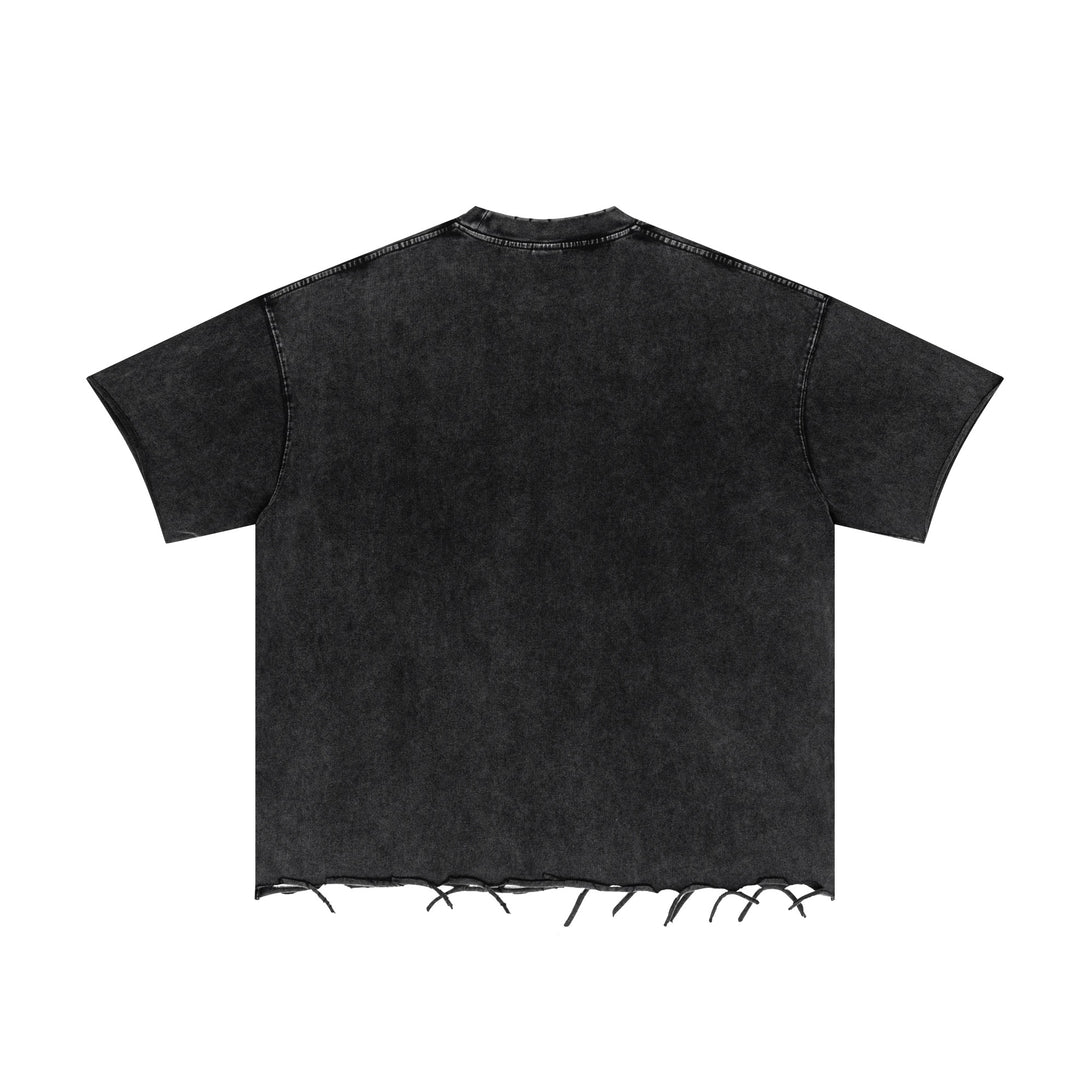 Back view of Black pigment-dye tee demonstrating garment drape and raw-edge construction.