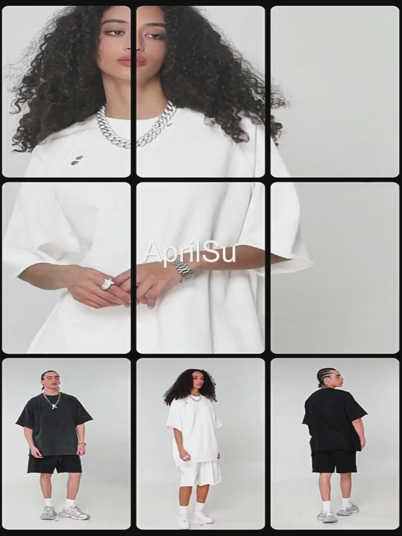 Model showcasing oversized cotton tee with artisan snow-wash technique and raw-edge trim in 5 shades (Off-White/Light Gray/Black/Dark Gray/Medium Gray). Video highlights vintage streetwear details for wholesale apparel suppliers.
