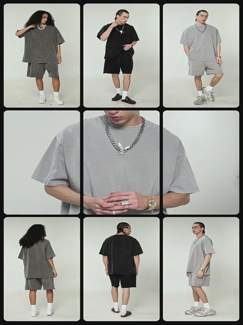 Professional model wearing Light Gray 100% Cotton Oversized Tee, showcasing vintage wash texture, distressed detailing, and streetwear fit in motion.