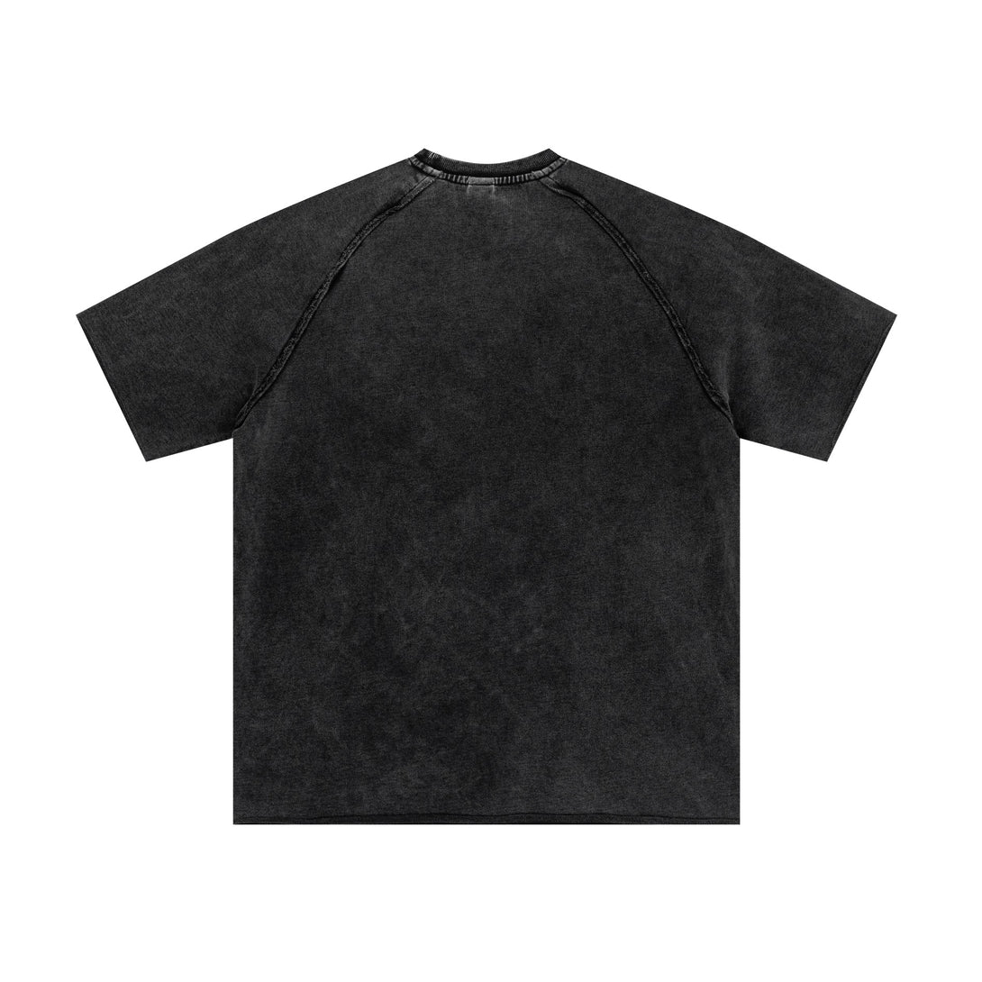 Back of dark gray oversized tee with raw-edge hem and snow-wash finish. Streetwear bulk supplier stock.
