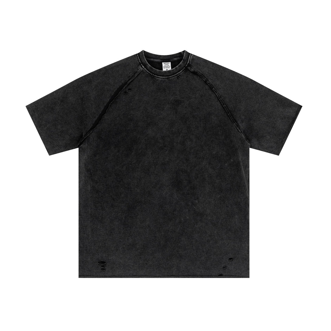 Dark gray raw-edge oversized tee with snow-wash texture, front perspective. Distressed wholesale streetwear supplier stock.