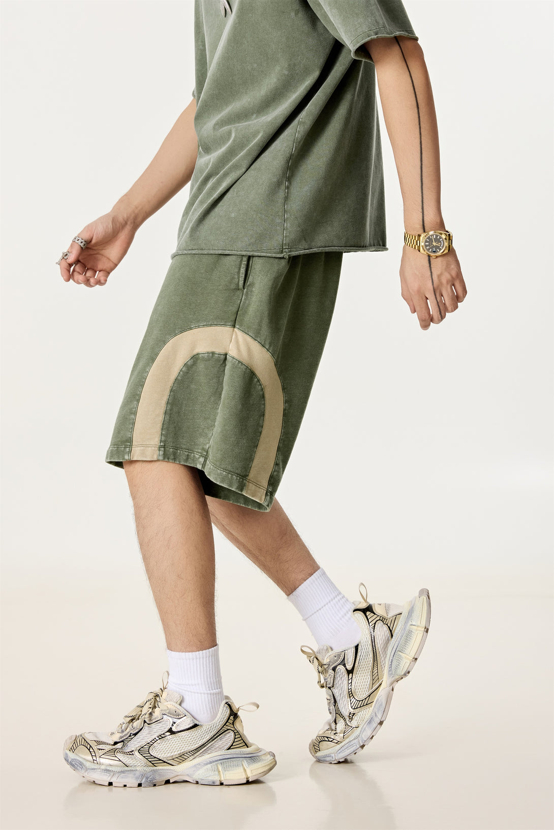 Model wearing snow wash shorts, back view