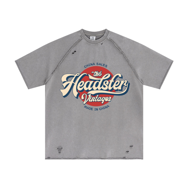 Light gray snow-wash street tee featuring distressed graffiti print - Raw-edge oversized unisex blanks for apparel suppliers