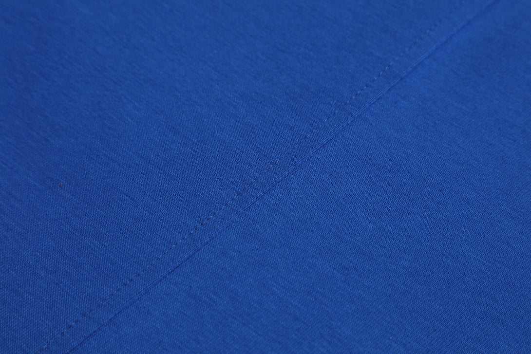 Reinforced armhole stitching detail on vest