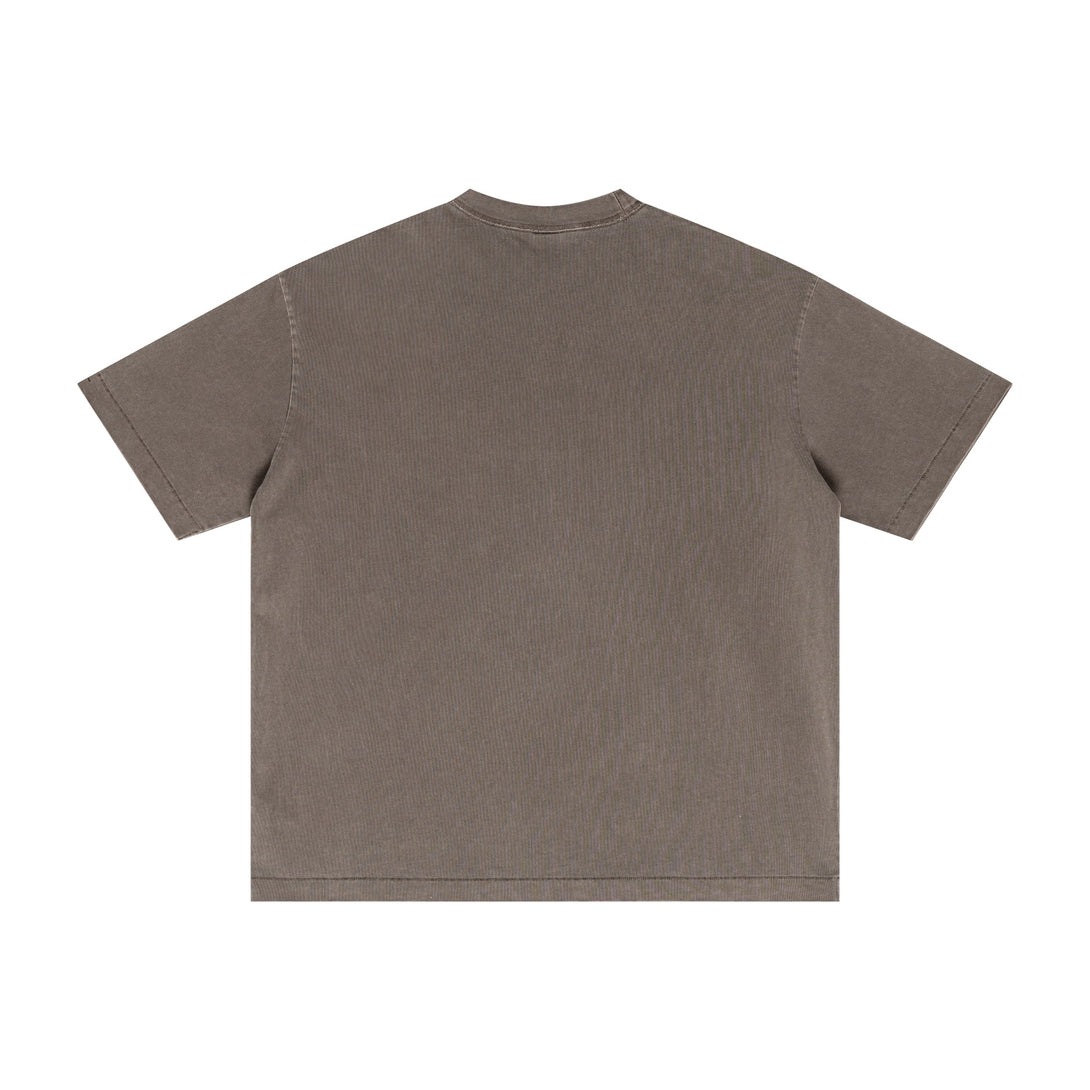 Coffee streetwear tee back showcasing pigment-dyed effect and distressed trim. Bulk vintage wash apparel.