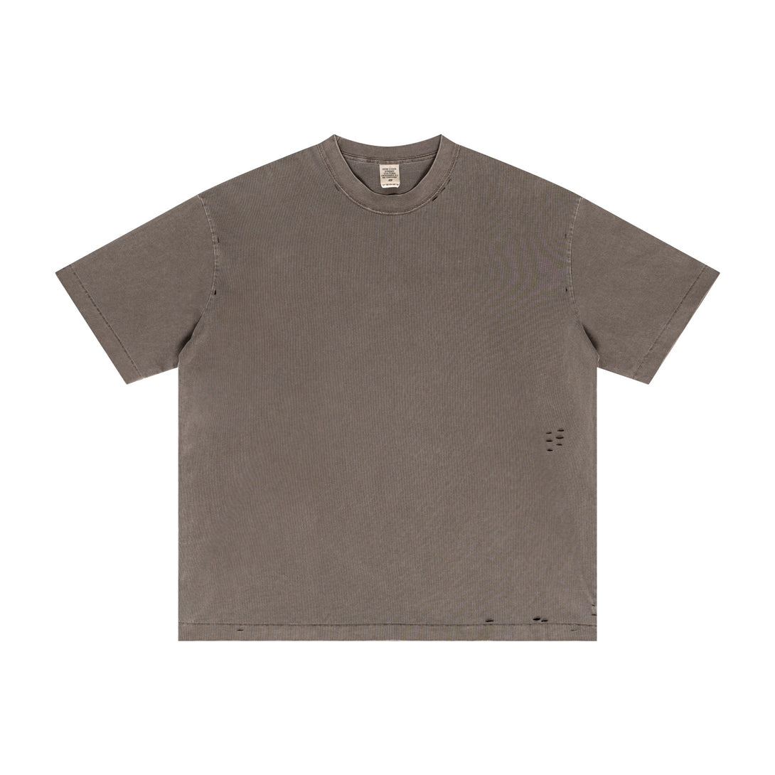 Coffee brown streetwear staple tee featuring pigment-dyed texture and vintage wash, oversized front. Bulk apparel supplier item.