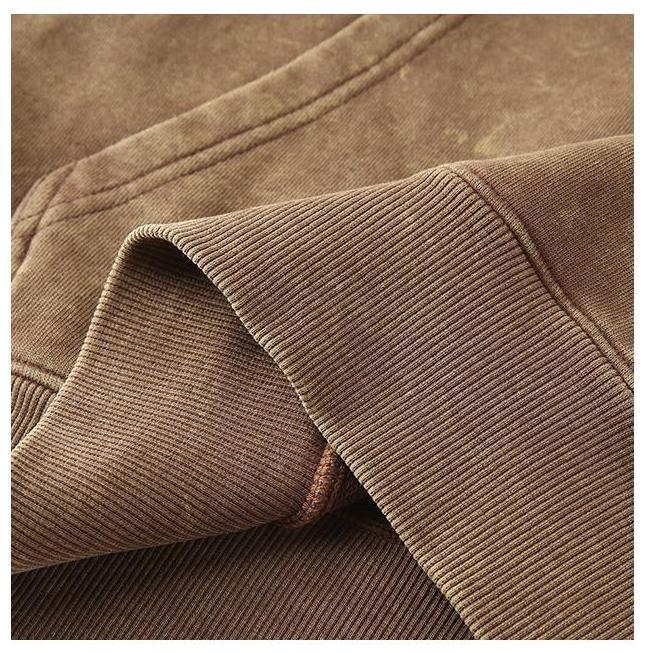 Vintage Wash Hoodie showcasing the textured fabric and ribbed cuffs for enhanced durability and style.