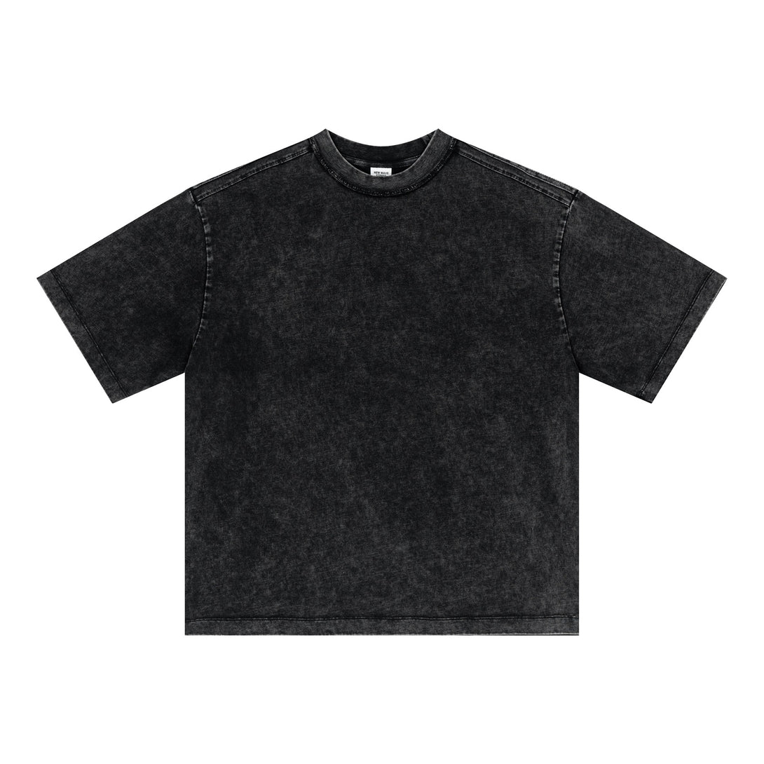 Black unisex oversized cotton t-shirt front with vintage craft detailing, bulk order streetwear essential.