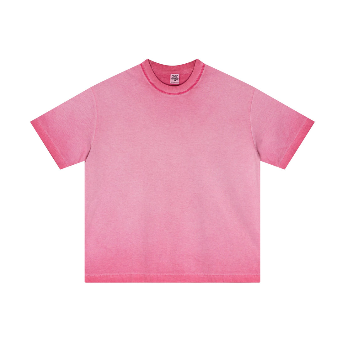 Rose red distressed cotton tee showcasing raw-hem trim and oversized fit, front. Vintage-inspired wholesale apparel.