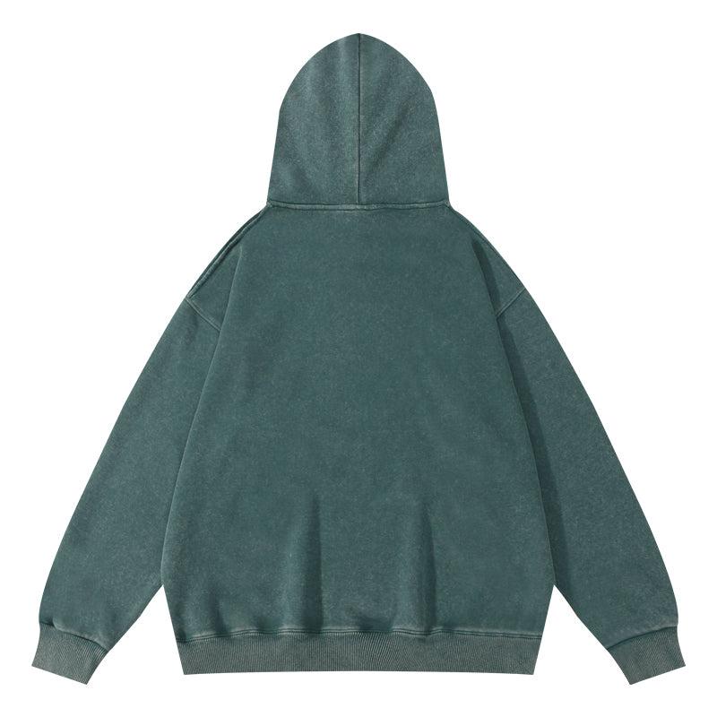 Bottle green wax-dyed pullover hoodie back view showing artisanal pattern