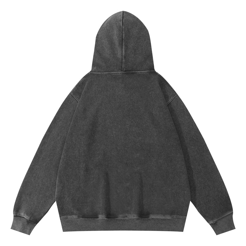 Back view of wax-dyed pullover hoodie in charcoal gray with unique wax pattern