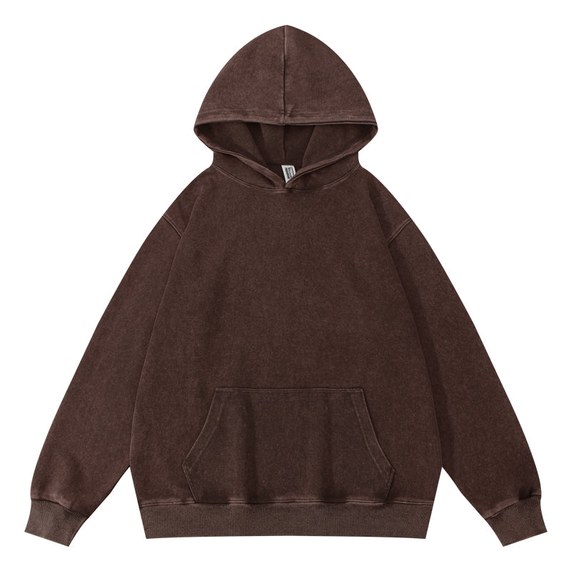 Front view of wax-dyed pullover hoodie in coffee brown with distressed effect