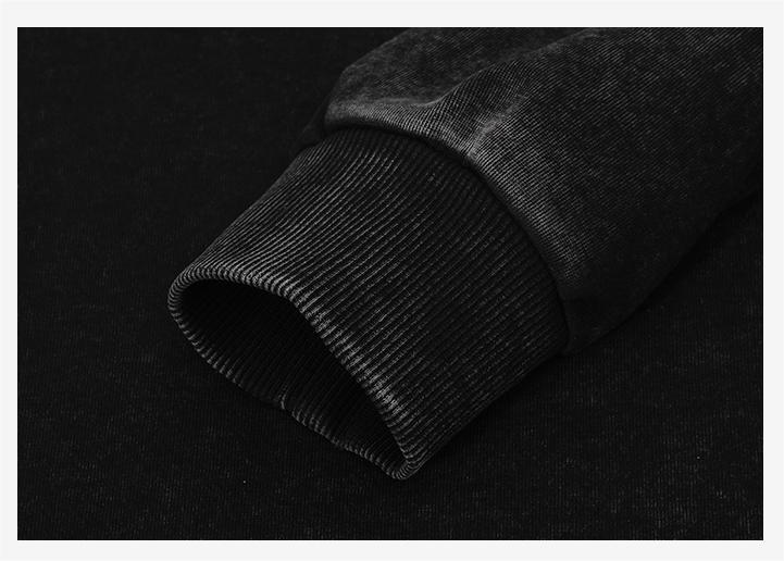 Cuff detail of wax-dyed pullover hoodie with 1x1 ribbing