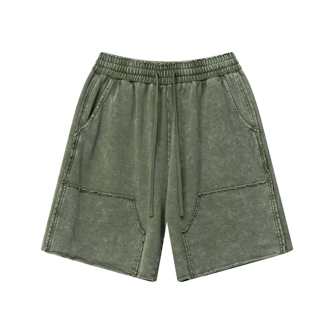 Front view of men's wax wash cargo shorts in Vintage Army Green
