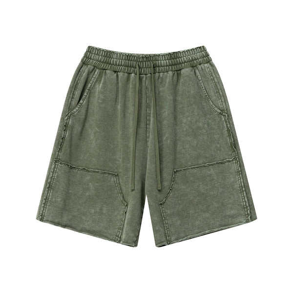 Front view of men's wax wash cargo shorts in Vintage Army Green