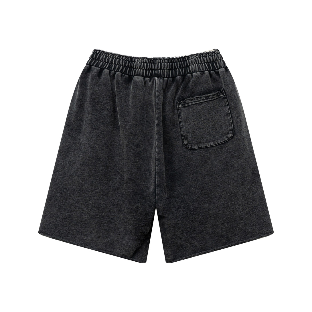 Back view of men's wax wash cargo shorts in Vintage Black