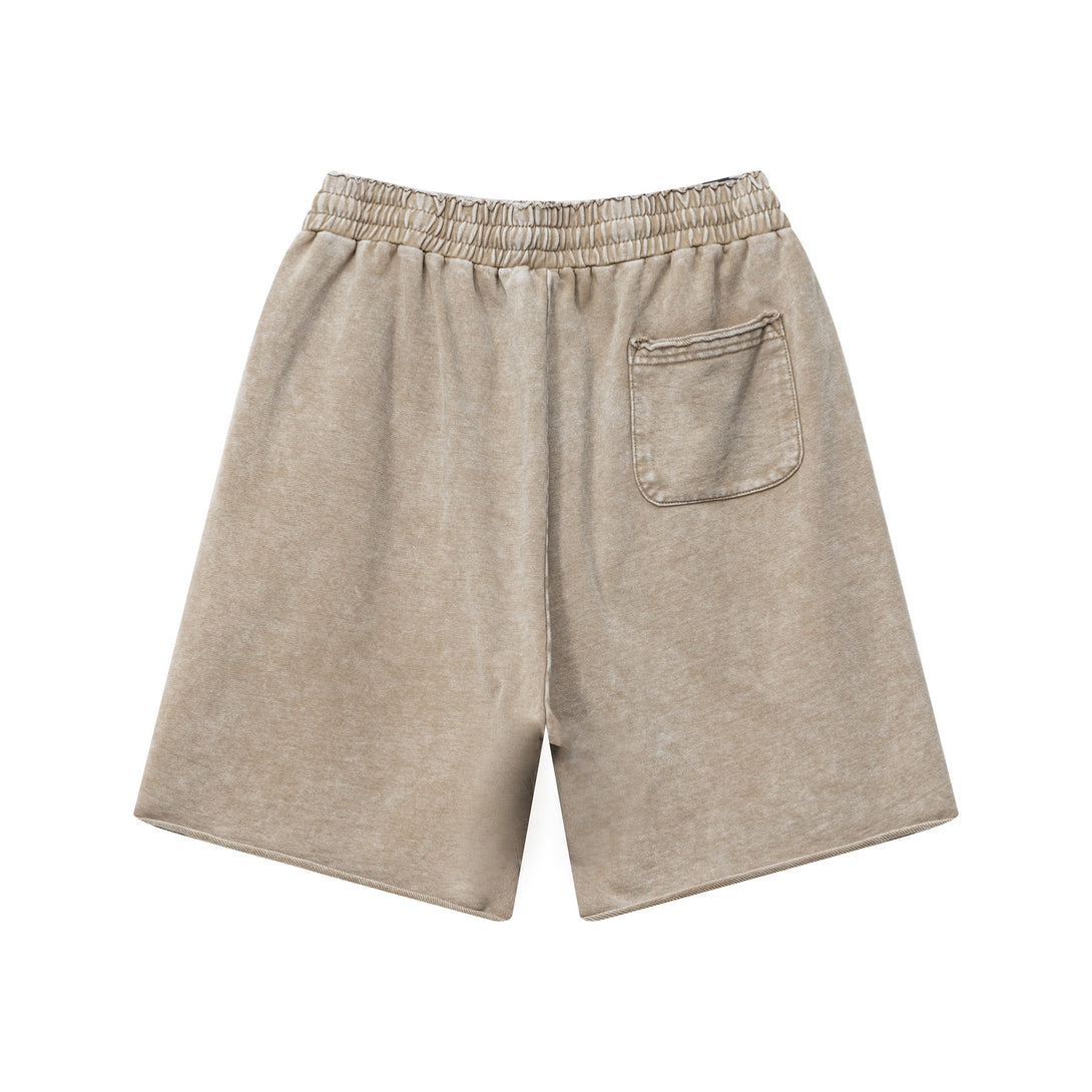Back view of men's wax wash cargo shorts in Vintage Khaki