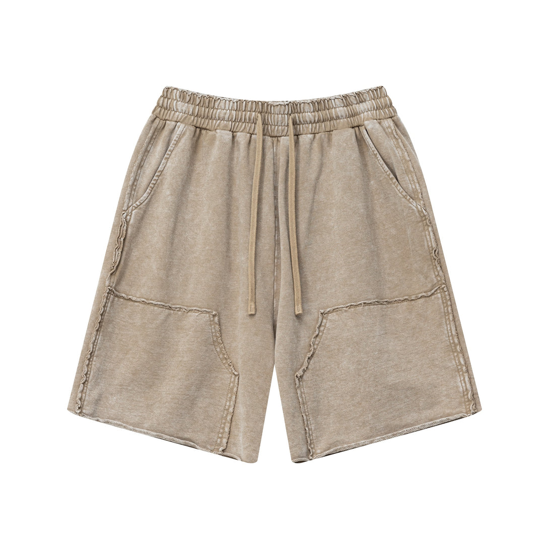 Front view of men's wax wash cargo shorts in Vintage Khaki