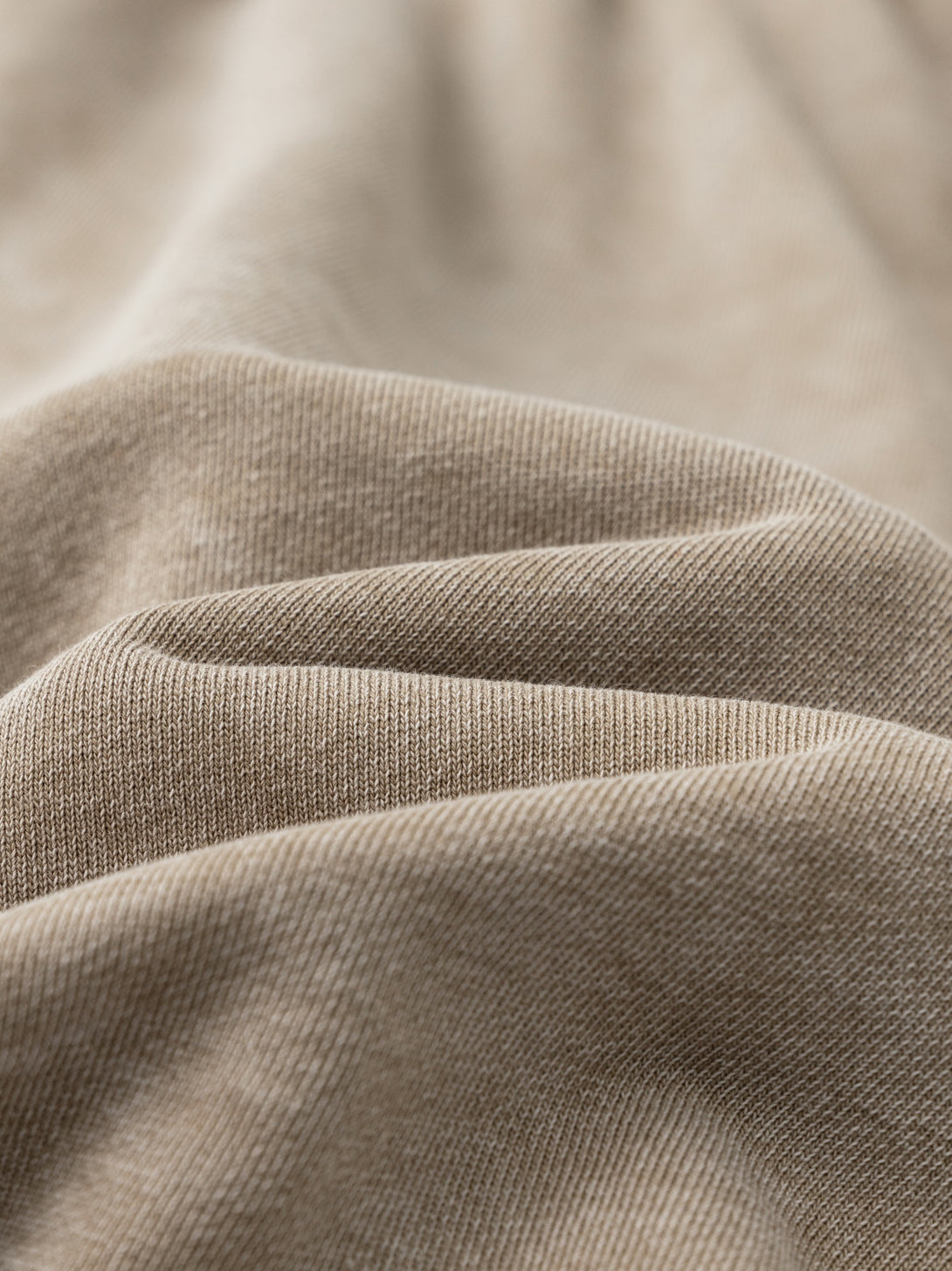 Texture close-up of 330g wax wash cotton fabric