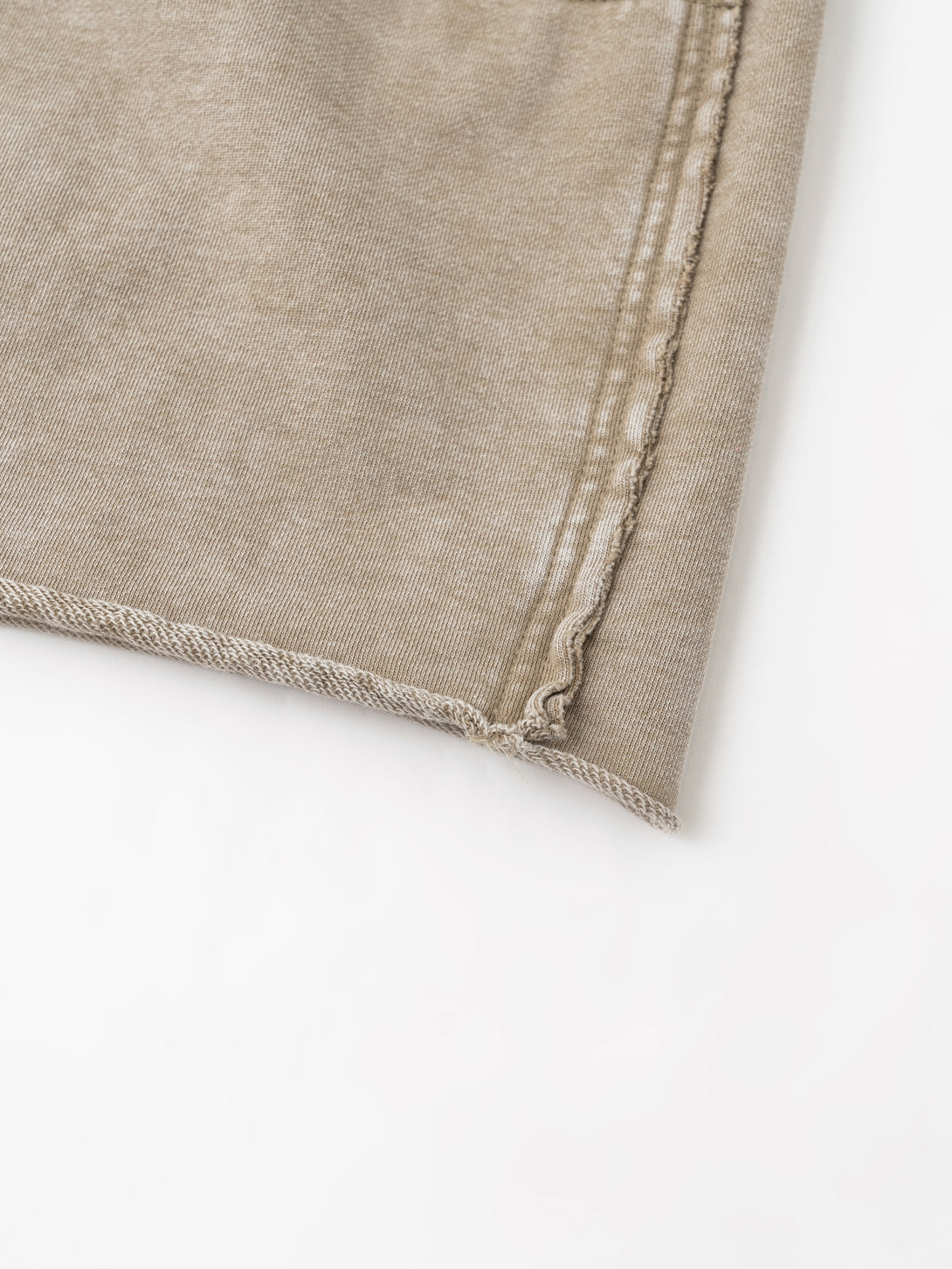 Hem finish of wax wash cargo shorts